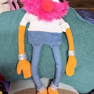 a plush toy of Animal, the chaotic drummer from The Muppets